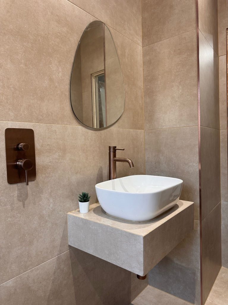 Copper tap and vessel basin in a bathroom supplied and installed by Premier Gas Burnley