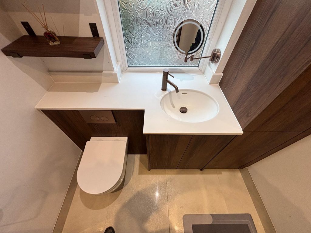 Walnut bathroom vanity unit supplied and fitted by Premier Gas Burnley
